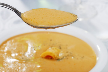 spoon full of cheddar cheese soup