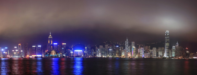 Fototapeta na wymiar Panorama of the skyline of Hong Kong at night, with mist