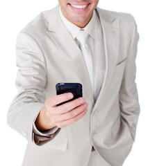 Close-up of a businessman sending a text