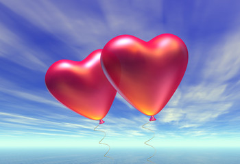 Fototapeta na wymiar Two heart-shaped baloons in the sky. Clipping path is included.