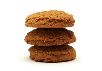 Stack of oatmeal cookies isolated on white