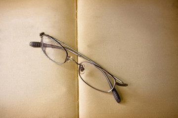 Vintage book and glasses