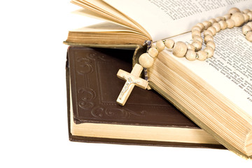 Rosary over an old holy bible