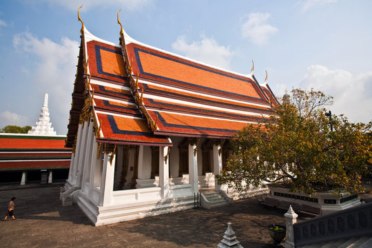 temple Phra Sri Ratana Chedi covered in the inner Grand Palace