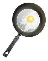 A fried egg in a frying pan isolated