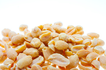 Salted peanuts isolated on white