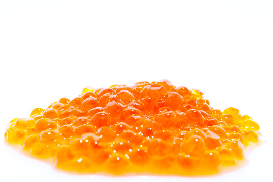 Red caviar isolated on white