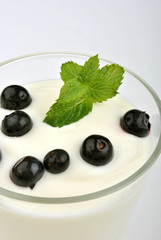 some organic fruit in natural yoghurt and mint