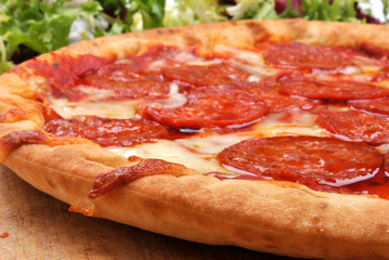 home made italian pizza with salami and cheese