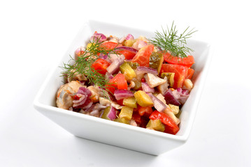 some fresh organic herring salad  in a bowl