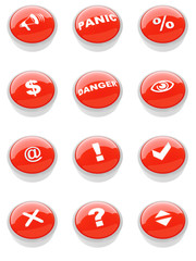 set of red buttons with a caution sign