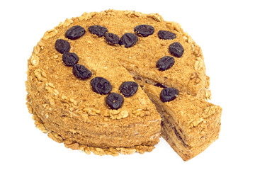 honey-walnut cake with prune stuffing with piece