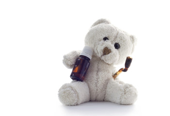Stoned Teddy bear on neutral background