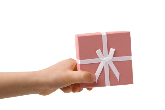 Kinderhand mit Geschnekbox