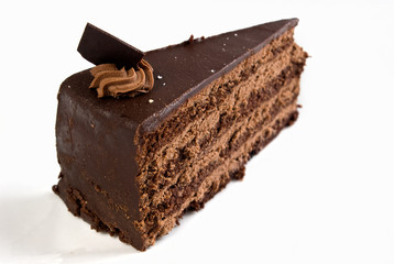 layered chocolate cake with ganache and butter cream filling