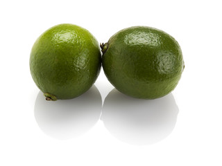 two limes isolated on white