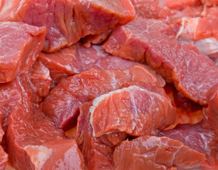 Close-up fresh natural meat to background