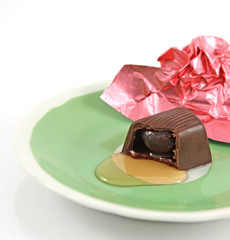 Splitted chocolate candy with cognac filling