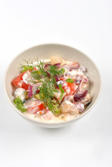 some fresh organic herring salad with tomato