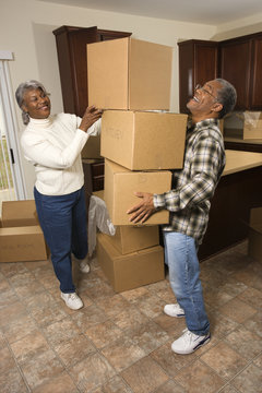 Senior Couple With Moving Boxes