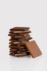 Pile of chocolates on a white background