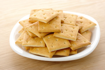 Yellow cookies on plate