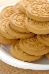 Yellow cookies on plate