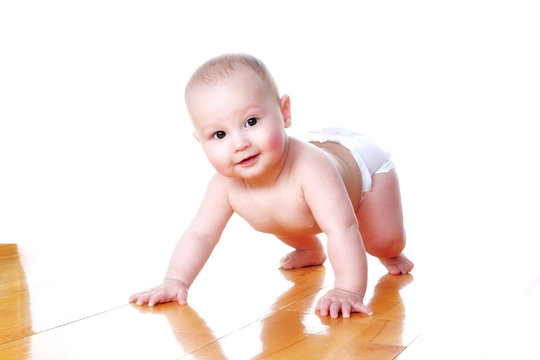 Lovely Smiling Baby 6 Month Old In Diaper At Flat