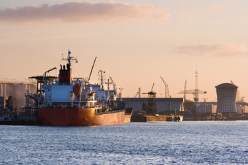 Fototapeta premium Ships on the river at colorful sunrise in october