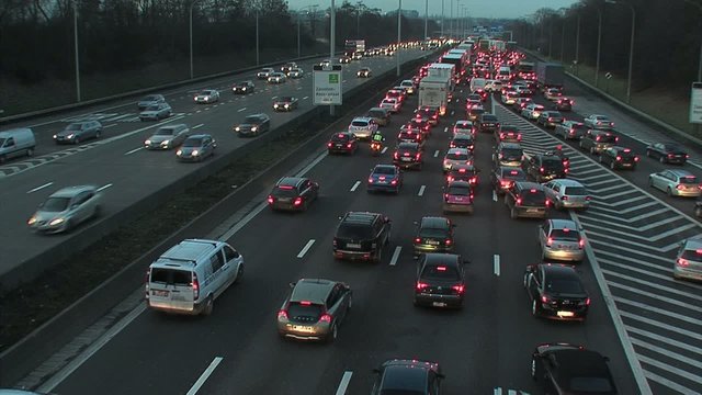 Night falls over Brussels traffic jam timelapse