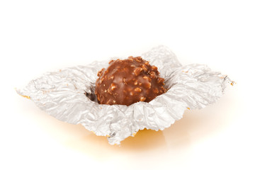 Delicious candy in golden foil