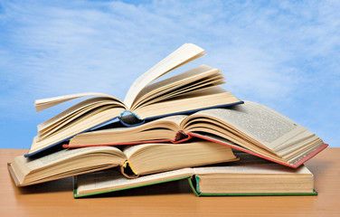 Pile of books on shelf