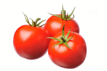 Three tomatoes on a white background