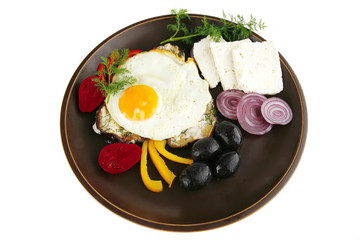 fried egg on dark dish