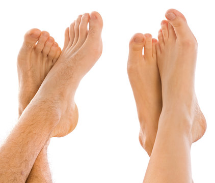 Young couples foot side by side