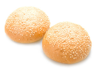 Two tasty baked rolls with sesame isolated