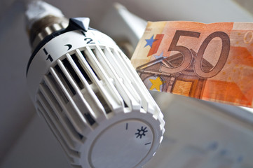 Heizungsregler mit Geldschein