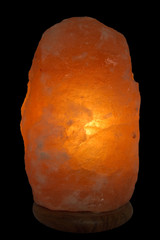 Orange salt lamp on black background - 20001116