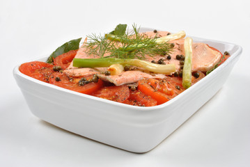 steamed trout with organic tomato in a bowl