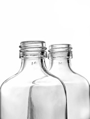 Two glass bottles black and white
