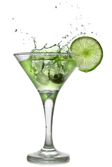 Green alchohol cocktail with splash and green lime