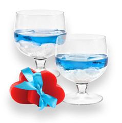 A two glasses of liqueur with two hearts.