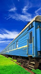 Fototapeta premium blue carriage on a railway