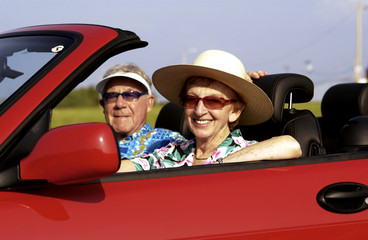 Senior couple in convertible