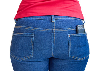 Cellphone sticking out of a jeans pocket in a woman body