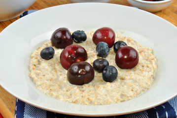 organic fruit with porridge on a plate