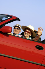 Senior couple in convertible