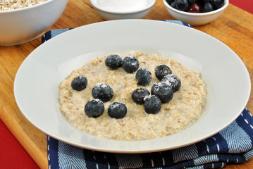 organic fruit with porridge on a plate