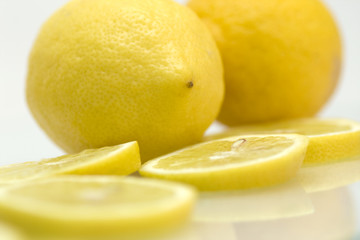 Lemons and slices of lemon