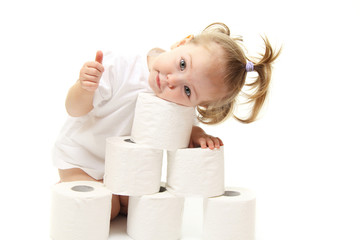 Baby girl with toilet paper